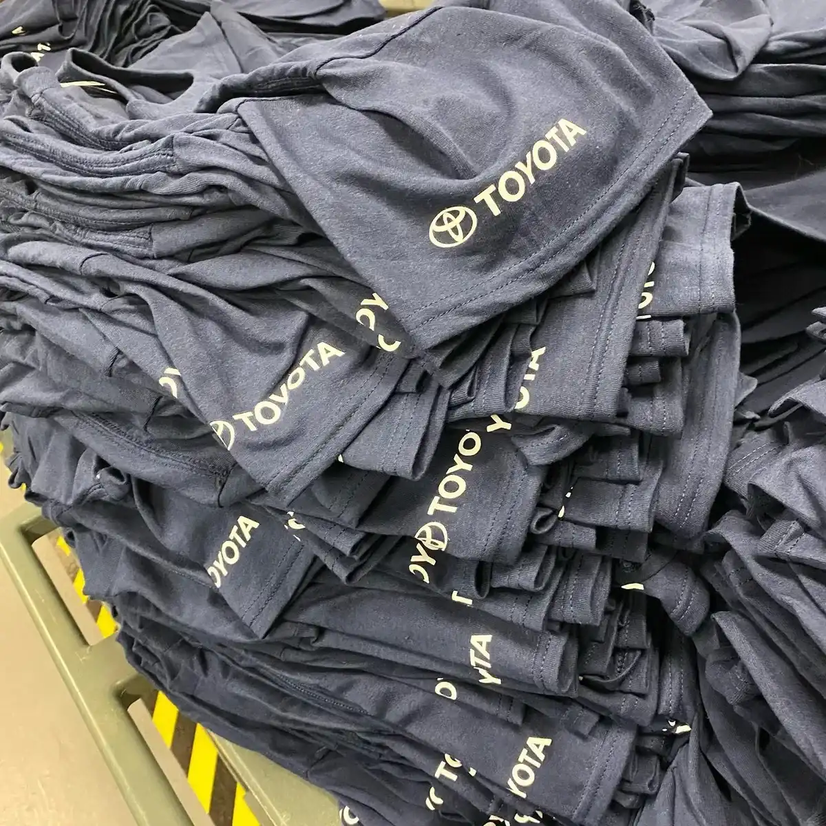 Bulk workwear t-shirt order with company logos — workwear printing Watford